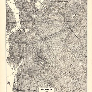 May include: A black and white vintage map of Brooklyn, New York, labeled World Atlas and Gazetteer, page 278. The detailed cartographic print displays street grids, the East River, Prospect Park, and Greenwood Cemetery with a scale bar.