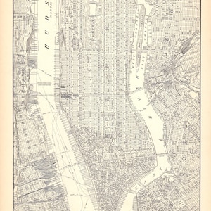 May include: A black and white vintage map of Manhattan, New York, labeled World Atlas and Gazetteer. It displays the street grid, Central Park, the Hudson River, and the East River. Text at the bottom describes the geography of Lower Manhattan.