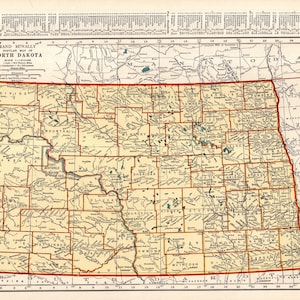 May include: A vintage map of North Dakota, featuring a detailed depiction of the state's counties and geographical features. The map, from Rand McNally, is in shades of beige and brown, with red borders and text. The title "North Dakota" is prominently displayed.