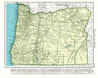 May include: A vintage map of Oregon, USA, with county borders outlined in green. The map shows the state's major cities, rivers, and lakes. The map is titled "Rand McNally Popular Map of Oregon".