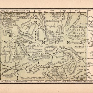 May include: Antique map of Wyoming, featuring detailed geographical features such as mountains, rivers, and cities. The map is from an atlas and includes text labels and a border, with the title "MAP OF WYOMING" visible.