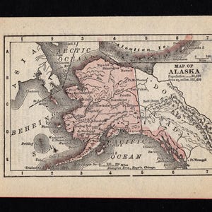 May include: An antique map of Alaska printed on cream-coloured paper with black ink lines and pale pink shading. The map features the Arctic Ocean, Bering Sea, and Pacific Ocean, with grid coordinates and text reading Map of Alaska, Population 33,426.