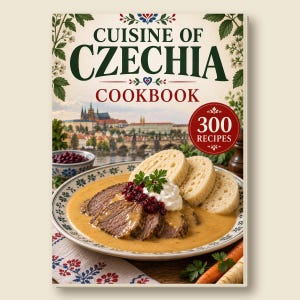 Op de afbeelding: Een kookboek getiteld Cuisine of Czechia Cookbook met 300 recepten. De omslag toont een foto van gesneden rundvlees in een romige saus met broodknoedels, gegarneerd met veenbessen en peterselie, tegen een achtergrond van Praag.