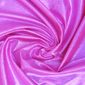 May include: Close-up of a vibrant, shiny pink fabric with a textured surface. The fabric is draped in soft folds, creating highlights and shadows that enhance its shimmering appearance. The material has a subtle, metallic sheen.