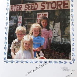 May include: A book cover titled "Classic Construction of Children's Clothing" featuring a photo of four children in front of a store. The cover includes text about basic yoke dresses and boy's button-on suits.