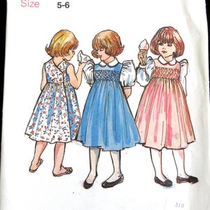 Children's Corner Mary De size 5 - 6, Sewing Pattern Girl Smocked Wrap Around Jumper or Sundress and Blouse 1983