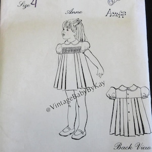 May include: A vintage sewing pattern for a child's dress, featuring a line drawing of a girl wearing the dress. The pattern is labeled "Anne" and "Size 4." The back view of the dress is also illustrated. The pattern is from The Children's Corner Patterns.