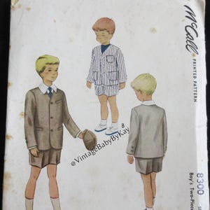 May include: A vintage McCall's printed sewing pattern envelope, number 8300, size 4, featuring illustrations of a two-piece suit and pajamas. The cover displays three figures wearing the garments, with text including the brand name and pattern details.