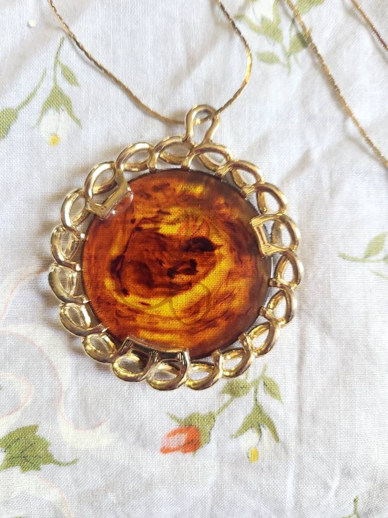 Vintage tortoise shell bakelite pendant with L monogram in a goldtone casing Free US shipping