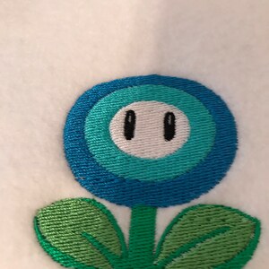 FIRE FLOWERChoose one Embroidered Iron-on Nintendo Throwback NES Mario Brothers. Indicate color in blue or orange. image 2