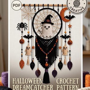 May include: A PDF crochet pattern for a Halloween dreamcatcher featuring a central ghost wearing a witch hat, surrounded by hanging elements including bats, spiders, pumpkins, stars, and leaves in black, orange, and cream colors.