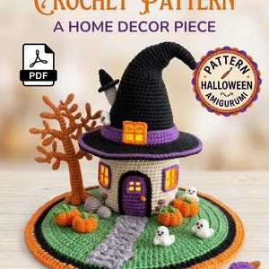 May include: A crochet pattern for a witch hat house featuring a beige house with a purple door, orange windows, and a large black hat roof. The scene includes a brown tree, orange pumpkins, and white ghosts on a green base with a grey stone path.