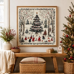 May include: A square wall art piece featuring a detailed winter scene with a central decorated Christmas tree, snow-covered ground, bare trees, and figures in red and black clothing. The artwork is framed in light wood and displays a festive holiday theme.