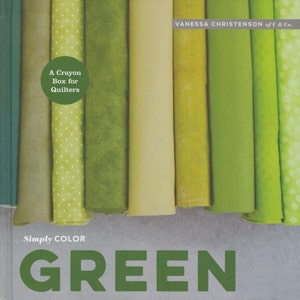 May include: A book titled "Simply Color GREEN" with the subtitle "A Crayon Box for Quilters" by Vanessa Christenson of J & Co. The cover features a variety of green fabric swatches.