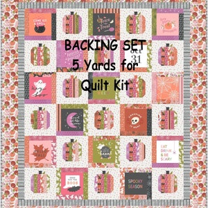May include: A quilt kit with a Halloween theme. The kit includes 5 yards of fabric with a variety of prints featuring pumpkins, ghosts, bats, and other Halloween imagery. The fabric is in shades of orange, pink, green, and black. The text on the fabric includes phrases like "Trick or Treat", "Hocus Pocus", and "Spooky Season".