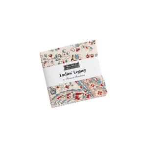 May include: A pack of fabric squares featuring a paisley and floral design in shades of red, blue, and cream. The fabric is labelled "Ladies' Legacy by Barbara Brackman".