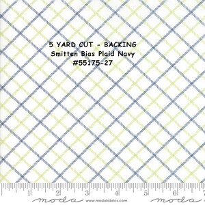 May include: A 5 yard cut of Smitten Bias Plaid Navy fabric in a white background with a blue and green plaid pattern. The fabric is labelled #55175-27.