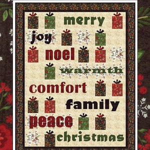 May include: A beige fabric panel with a Christmas theme. The panel features the words "Christmas to Me" at the top and a variety of Christmas-themed words and images, including "joy", "merry", "noel", "warmth", "comfort", "family", "peace", and "christmas". The panel is surrounded by a dark brown border with a floral pattern.