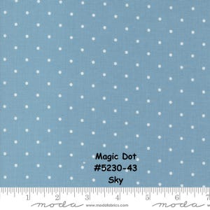 May include: A blue fabric with white polka dots. The fabric has the text "Magic Dot #5230-43 Sky" printed on it.