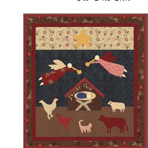 May include: A quilted wall hanging with a Christmas theme. The design features a nativity scene with angels, animals, and a star. The text "No Room At The Inn" is included in the design. The quilt is 81 cm by 89 cm.