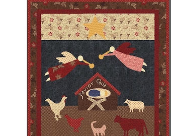 May include: A quilted wall hanging with a Christmas theme. The design features a nativity scene with angels, animals, and a star. The text "No Room At The Inn" is included in the design. The quilt is 32 inches by 35 inches.