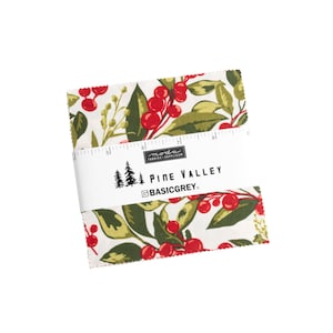 May include: A white fabric square with a red and green floral pattern. The fabric features a repeating pattern of red berries and green leaves. The fabric is labelled "Pine Valley" and "BasicGrey".