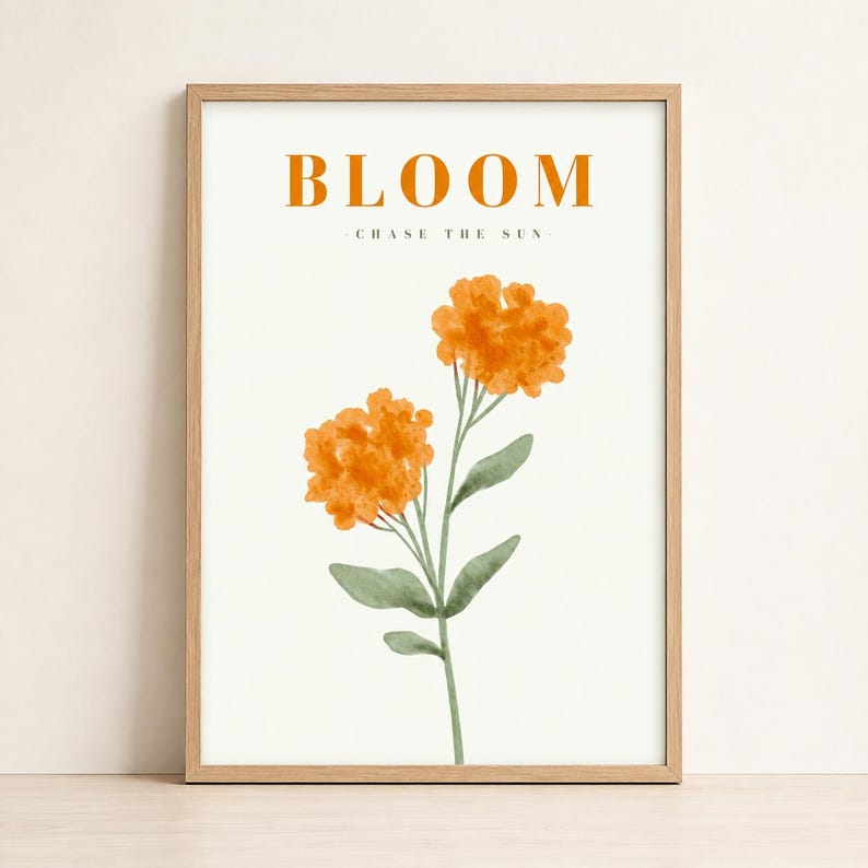 Orange watercolour floral bloom print in a light wood frame