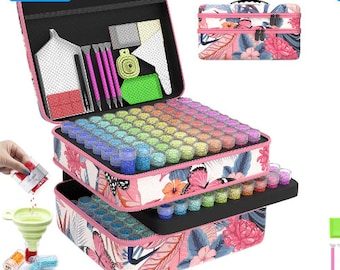 May include: A pink and white floral patterned storage case with a black lid and a clear plastic tray filled with small colourful containers. The case is open and the lid is propped up. The case is labelled "27% off".