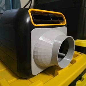 May include: A black BougeRV portable diesel heater featuring a yellow-trimmed rectangular air vent and a light gray 3D-printed circular duct adapter attached to the front face. The unit has a smooth, rounded rectangular housing design.