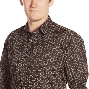 May include: A black long-sleeved shirt with a white honeycomb pattern. The shirt has a button-up front and a collar.