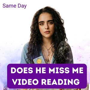 May include: A person with long dark curly hair wearing layered crystal necklaces and a blue shirt, holding a tarot card with a sun illustration. A purple banner displays the text "Same Day" and "DOES HE MISS ME VIDEO READING" in white.