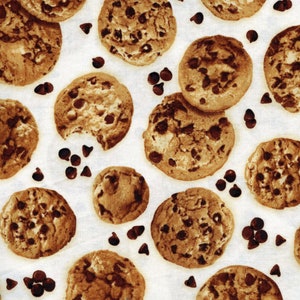 May include: A pattern of chocolate chip cookies and chocolate chips on a white background. The cookies are round with a golden-brown color and dark chocolate chips. Some cookies have a bite taken out of them.