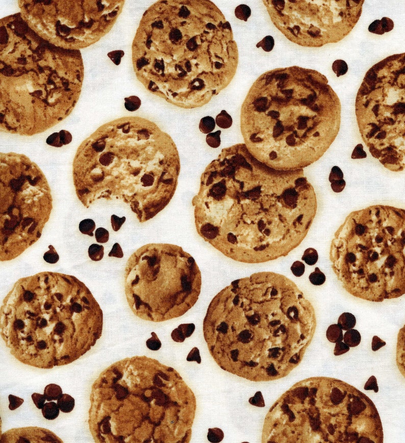 May include: A pattern of chocolate chip cookies and chocolate chips on a white background. The cookies are round with a golden-brown color and dark chocolate chips. Some cookies have a bite taken out of them.