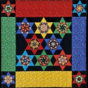 May include: A colorful quilt with a black background and a pattern of stars. The stars are made of different fabrics with various colors and patterns. The quilt is bordered with red, green, blue, and yellow fabric with white polka dots.