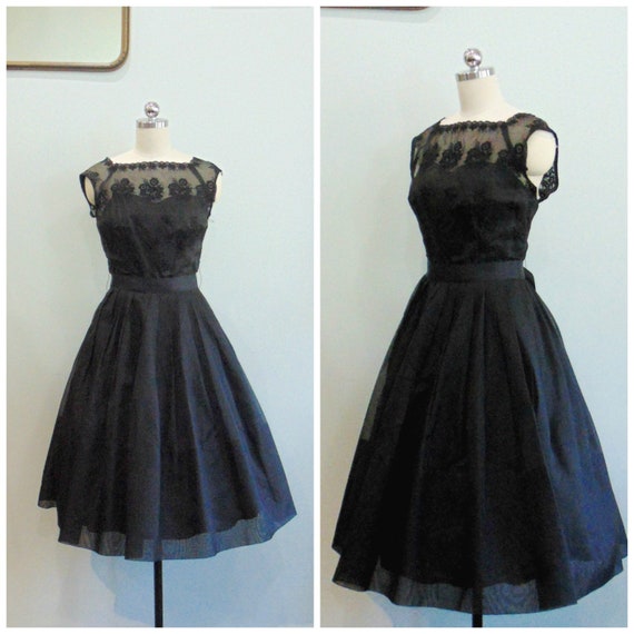black dress with sheer overlay