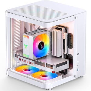 May include: A white computer case with a transparent side panel, showcasing internal components including a CPU cooler with a multi-colored RGB fan, a Radeon graphics card, white RAM modules, and two additional multi-colored RGB fans at the base.