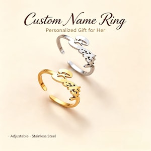 Könnte beinhalten: Zwei verstellbare Ringe aus Edelstahl mit dem Namen "Becky" in Schreibschrift. Ein Ring hat eine polierte silberfarbene Oberfläche, der andere eine polierte goldfarbene Oberfläche. Der Text "Custom Name Ring" und "Personalized Gift for Her" steht über den Ringen, "Adjustable · Stainless Steel" darunter.