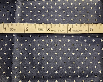 Small white crosses on a dark navy background, Alexia Marcelle Abegg, Ruby Star Society collection from 2019, fat quarter