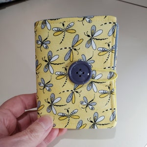 Dragonfly pattern needlebook or pin holder in yellow and grey.