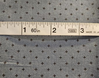 Small black crosses on a blue/grey background, Alexia Marcelle Abegg, Ruby Star Society collection from 2019, fat quarter
