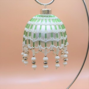 Cream and green beaded ornament