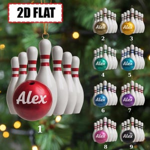 May include: A 2D flat Christmas tree ornament featuring a set of white bowling pins with red stripes and a red bowling ball with the name Alex printed in white. The image displays nine numbered variations of the ornament with different colored balls.