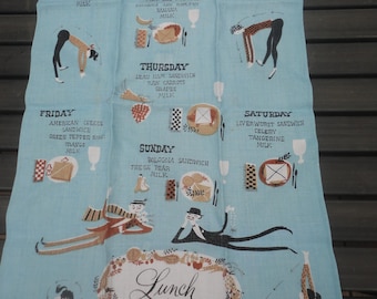 May include: Light blue vintage kitchen towel with illustrations of yoga poses and daily lunch menus. Features text for each day of the week, including sandwich and fruit options. The word "Lunch" is in a decorative frame.