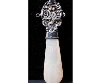 Victorian sterling silver, and mother of pearl baby rattle.