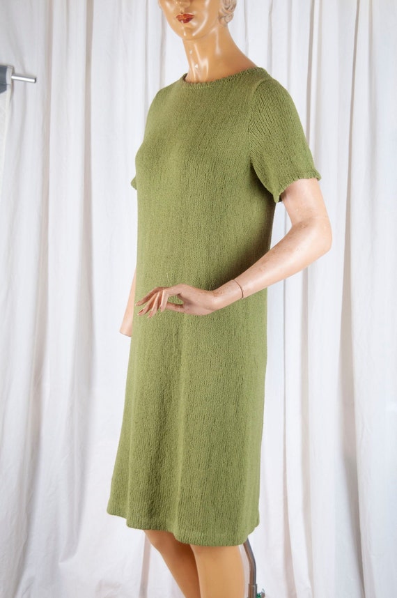 1970s, Avocado green knit short sleeved bespoke dr