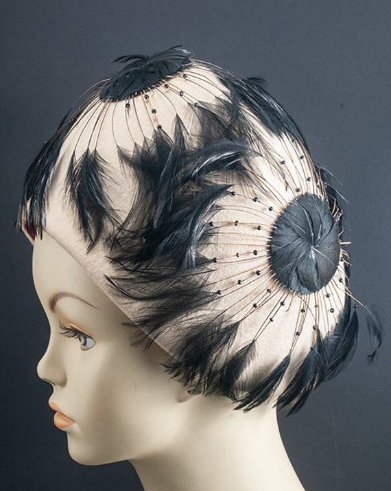 1960s Miss Berner sculpted feather cloche. High fa