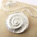 see more listings in the Fossil Jewellery section