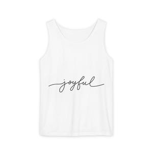 May include: A white sleeveless vest top featuring the word joyful written in a black, thin, cursive script font across the centre of the chest. The garment has a scoop neckline and wide shoulder straps, presenting a clean and simple design.