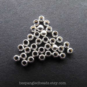 50 Sterling Silver 2mm or 2.5 mm Tiny Round Spacer Beads, .9 - 1.2mm hole