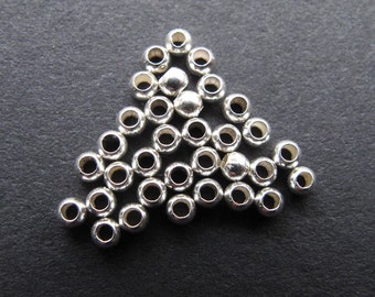 50 Sterling Silver 2mm or 2.5 mm Tiny Round Spacer Beads, .9 - 1.2mm hole